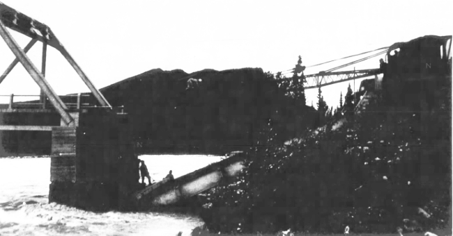 Racing River Bridge on Alaska Highway damaged by flood, July 1974