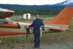 Returning to the Cessna with a good load of fish from Teslin Lake in 1985