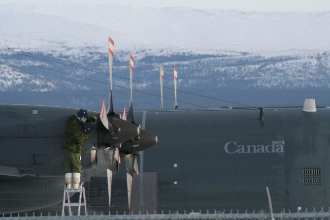 Working on the engine of a C-130 Hercules at 34 below with a screaming wind in Whitehorse, Yukon