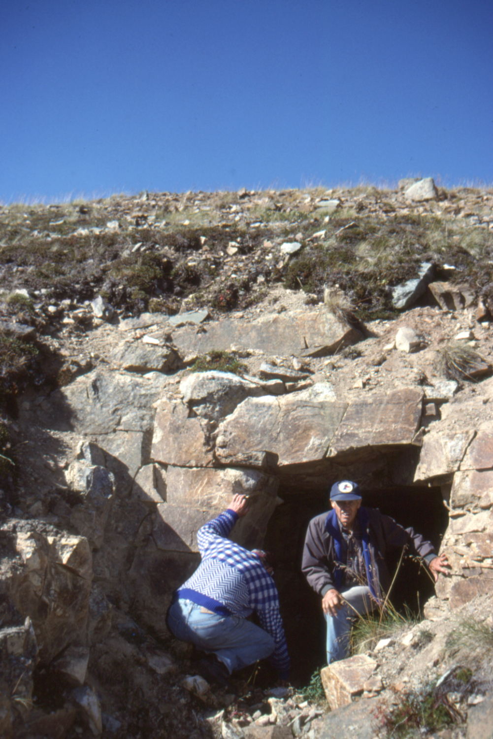 Gord Ryder and John Scott have a look at a test adit on the Uranus claim, Montana Mountain, Yukon.