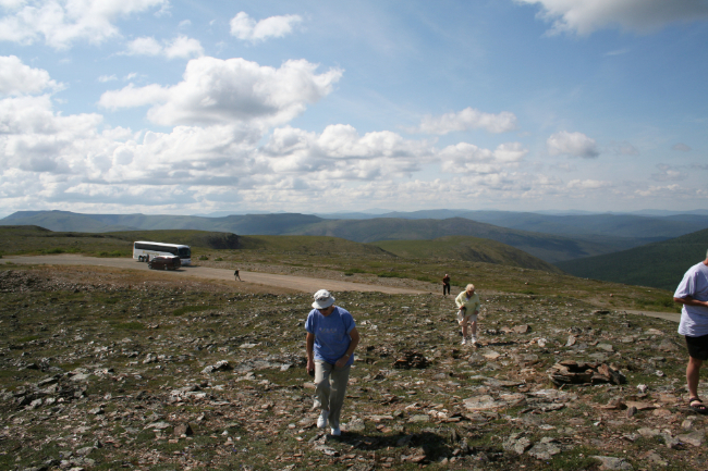 With a tour group at the summit of the Top of the World Highway in the Yukon
