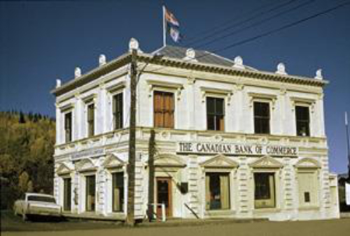 General view of the Canadian Bank of Commerce, showing its four-bay symmetrically organized facade, 1985. Photo by Parks Canada.