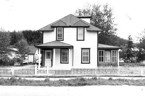 View of the front (west) elevation of the Black Residence in Dawson, 1987. Photo by Parks Canada.