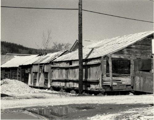 Rear view of Lowe's Mortuary, showing the log and wood frame construction, 1987.Photo by Parks Canada.