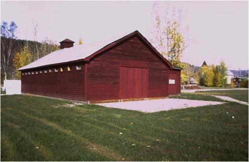 Side view of the N.W.M.P. Stables. Photo by Guy Masson, via Parks Canada.