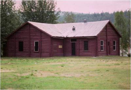 N.W.M.P. Stables. Photo by Guy Masson, via Parks Canada.