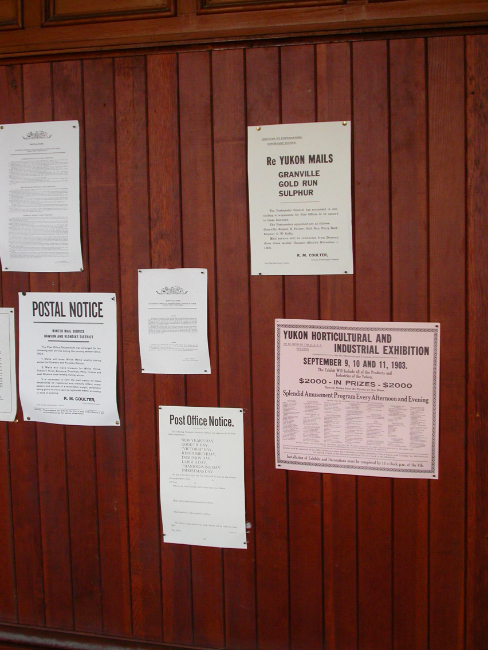 Notices on the wall inside the old post office on August 4, 2007. Photo by Murray Lundberg.