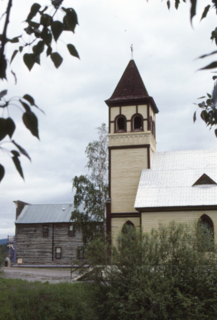 St. Paul's Anglican Church, with the Yukon Hotel in the background, on August 25, 1990. Photo by Murray Lundberg.