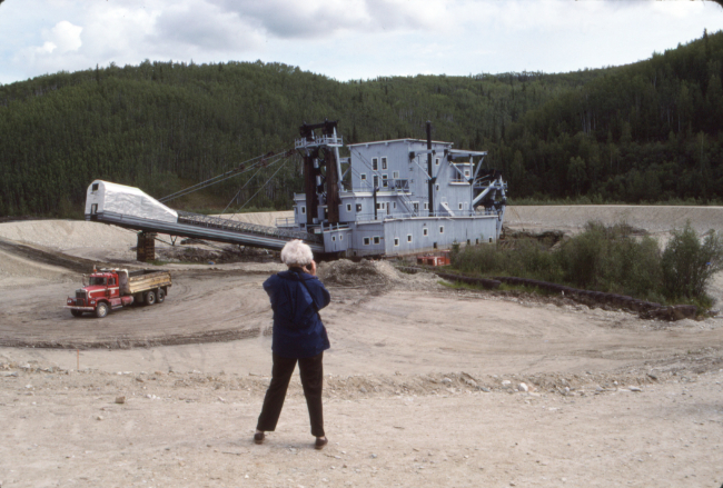 Working to float or at least level Dredge No. 4, in July 1991. Photo by Murray Lundberg.