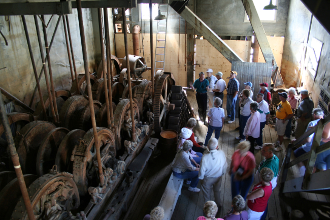 Touring the interior of Dredge No. 4 on June 14, 2006. Photo by Murray Lundberg.