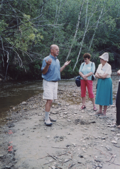 Motorcoach driver/guide Murray Lundberg tells the story of the discovery of Klondike gold on Discovery Claim, July 2004.