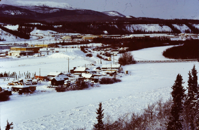 The Shipyards squatter community in February 1993; John Hatch's house (the Pioneer Hotel) is the one closest to the footbridge to Kishwoot Island. Photo by Murray Lundberg.