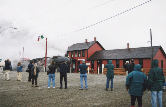 Steam locomotive No. 73 in Carcross with a railfans group on September 16, 2000. Photo by Murray Lundberg.