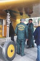 Crew members talking about Fokker Super Universal CF-AAM during her visit to Carcross, Yukon - June 13, 2001