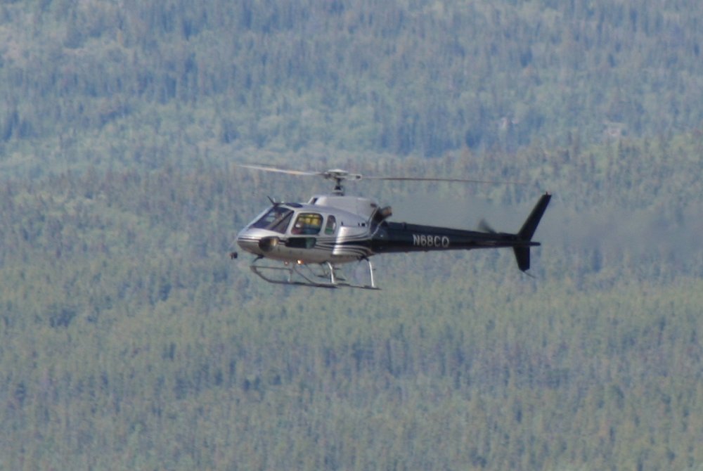 A photograph of N68CQ, a Eurocopter AS 350 B2