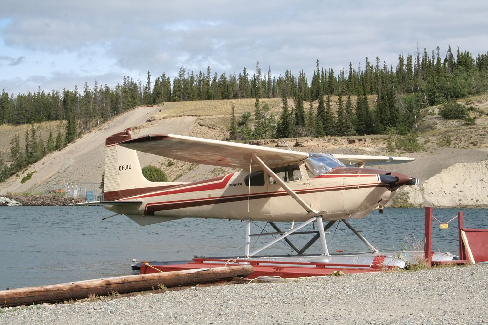 A photograph of C-FJIU, a Cessna 180A