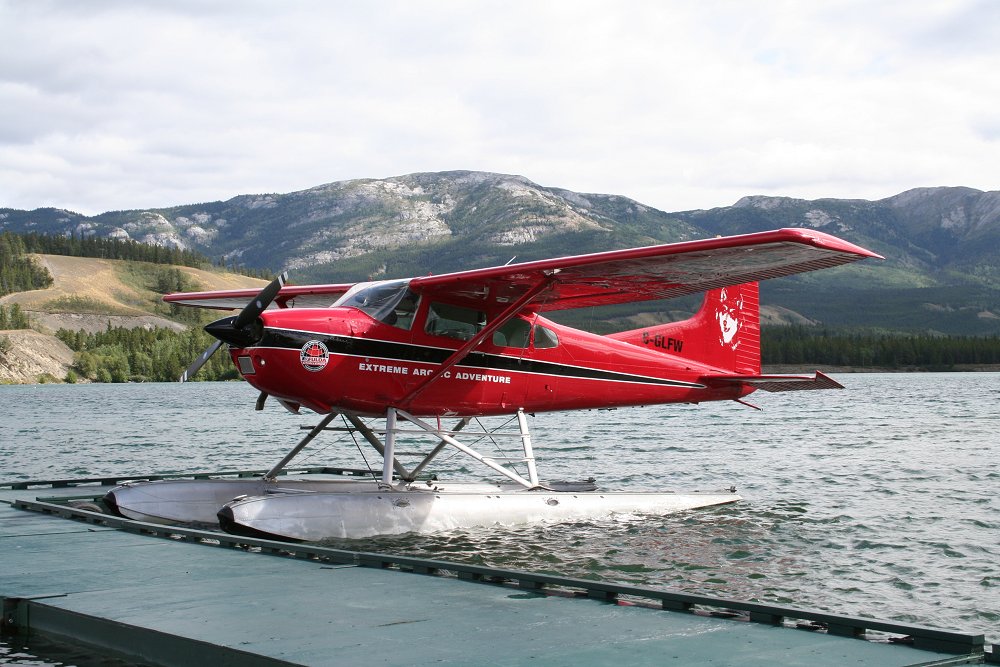 A photograph of C-GLFW, a Cessna 180J