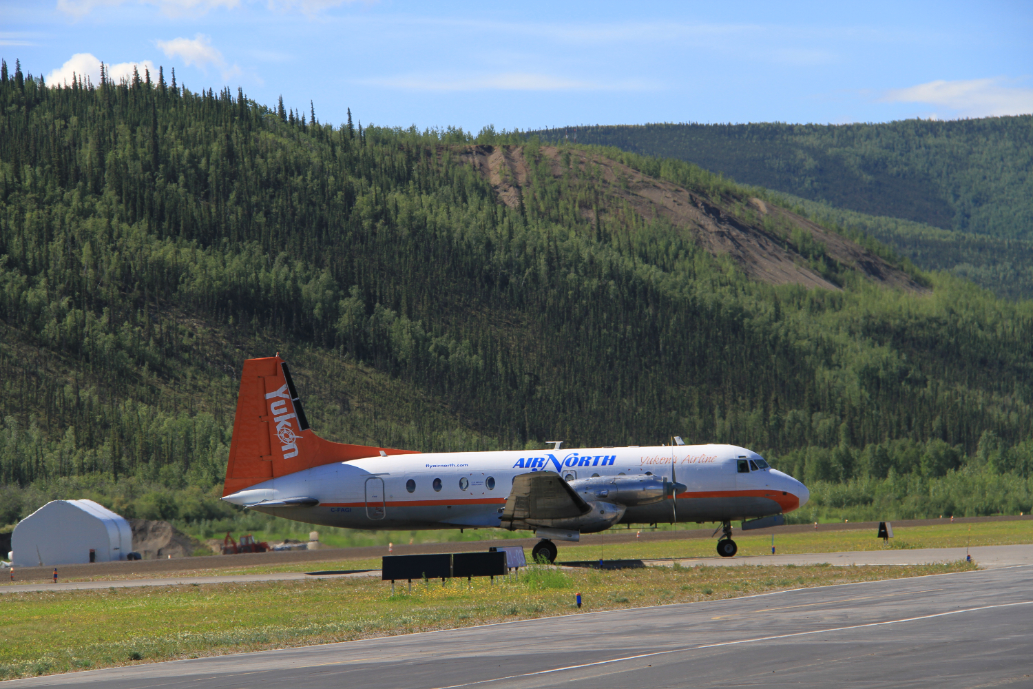 Air North's Hawker Siddeley HS 748 C-FAGI taxiing at Dawson City (YDA) on June 28, 2014.