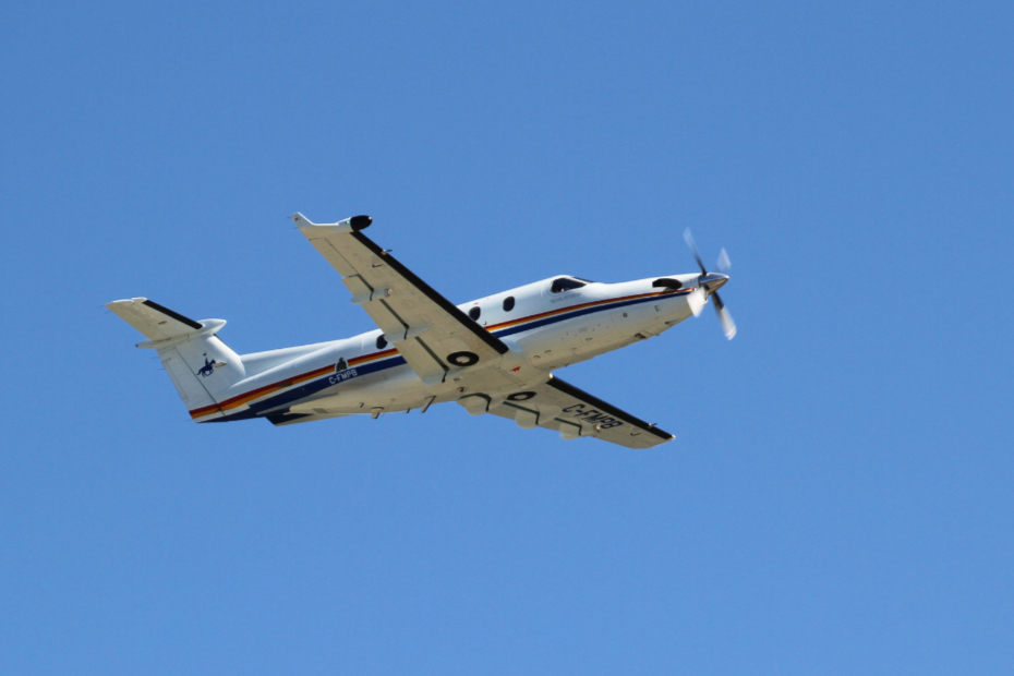 The Yukon RCMP's Pilatus PC-12/45 C-FMPB taking off at  Whitehorse, Yukon