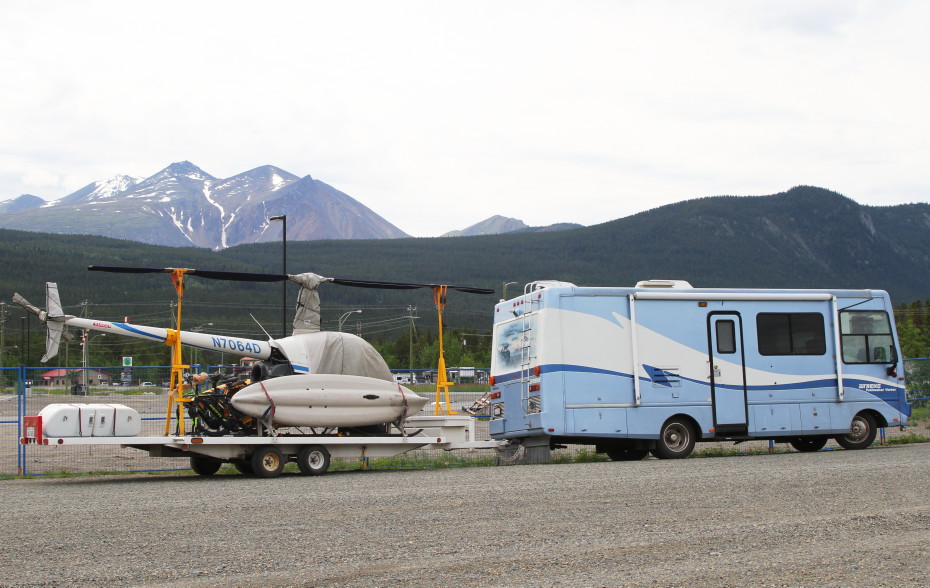 Robinson R22 helicopter N7064D being towed by an RV at Carcross, Yukon (CFA4), on June 22, 2019.