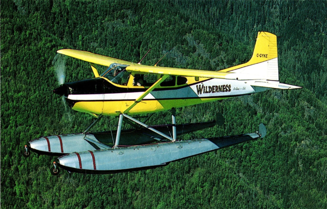 Postcard, ca. 1985: Cessna A185F Skywagon C-GYKE in the Bella Coola Valley. Photo by Henry Tenby.