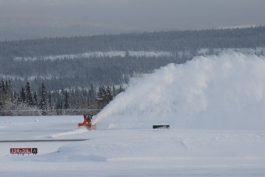 Clearing snow at Erik Nielsen Whitehorse International Airport