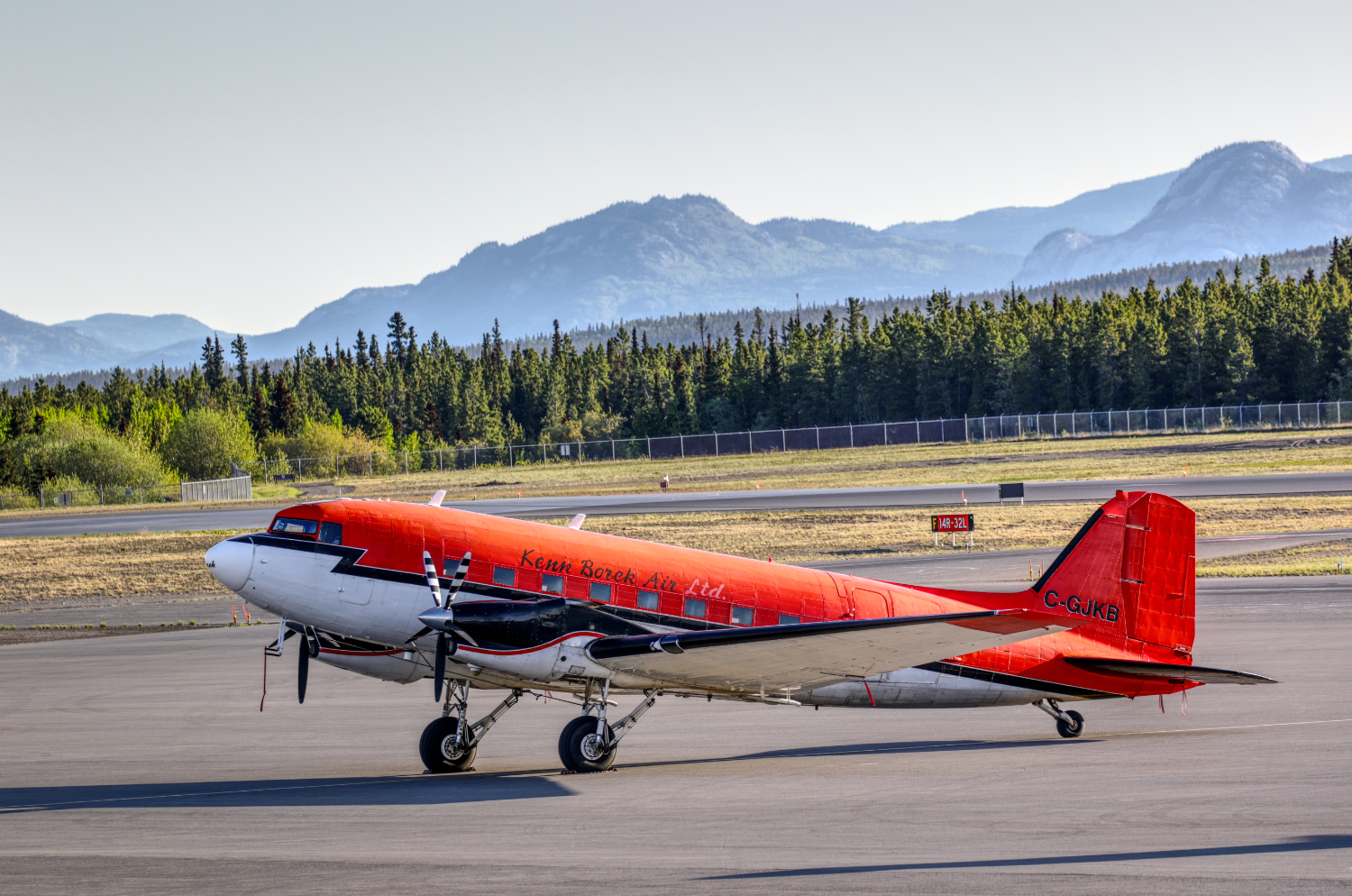 Kenn Borek Air's Basler BT-67 C-GJKB at Whitehorse, Yukon (CYXY) on May 25, 2023. It is registered as a 1944 Douglas DC-3C, serial number 13383, but has been heavily modified, most noticeably by the conversion to turbine engines.