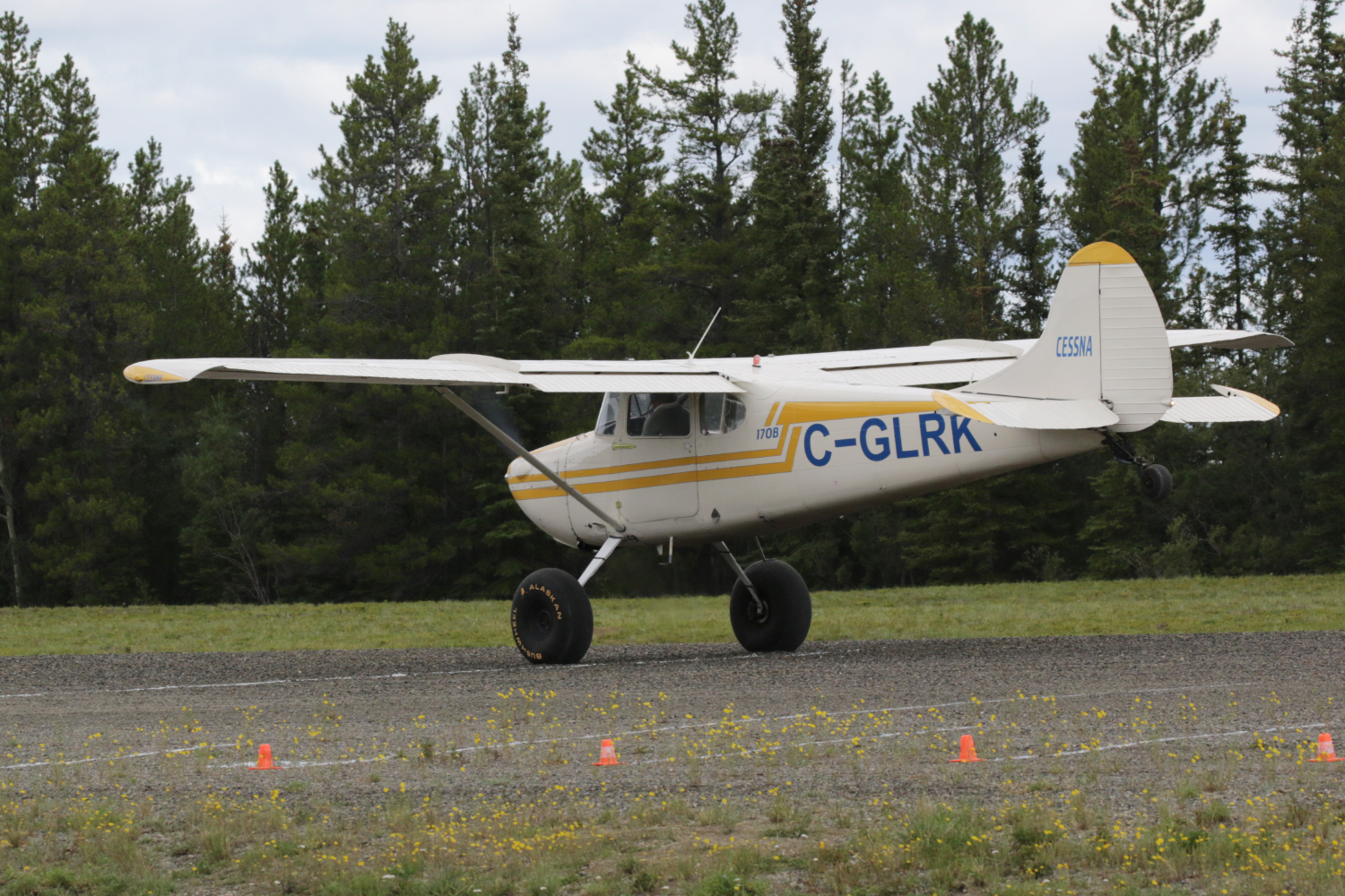 A photo of C-GLRK, a 1953 Cessna 170B, at Cousins Airport, Yukon (CFP8), on July 25, 2026.