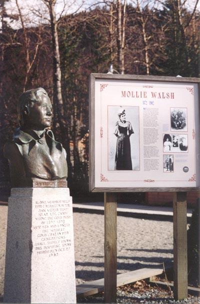A statue of Mollie Walsh stands in a park in Skagway, Alaska.