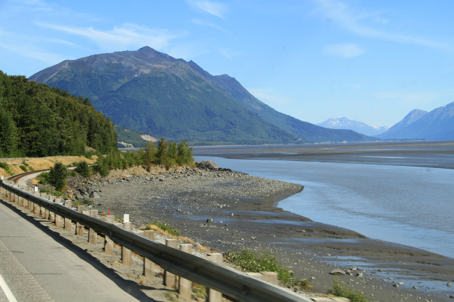 Looking south along Turnagain Arm, with the Alaska Railroad tracks below the Seward Highway. Photo by Murray Lundberg.