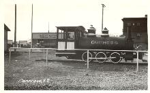 A historic postcard showing the little locomotive 'Duchess' at Carcross, Yukon