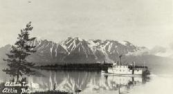 A historic postcard showing the lake steamer Tarahne at Atlin, BC