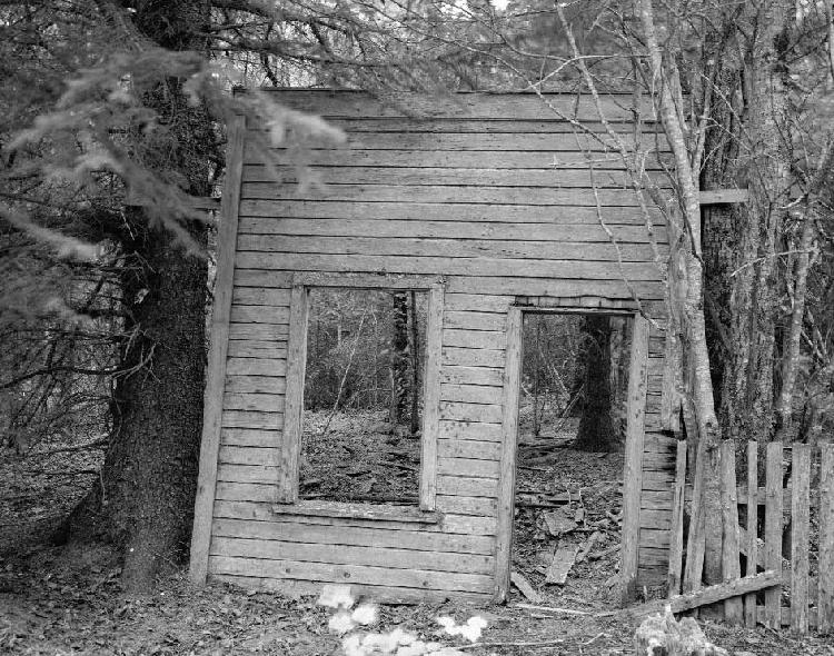 Photo of the false front wall, looking west