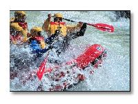 Raft in severe white water