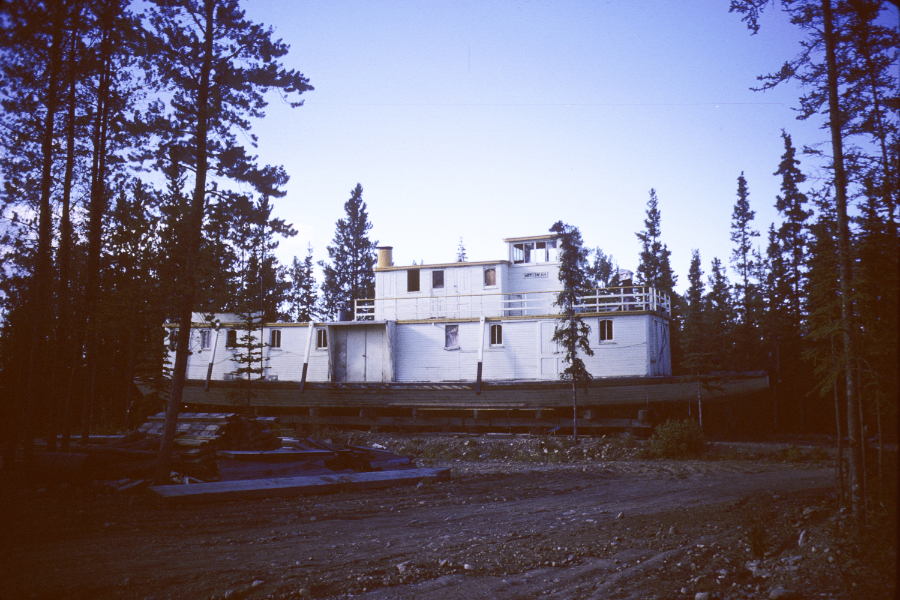 The riverboat Neecheah at Mile 900 of the Alaska Highway in 1966 - Ted Ter Voert bought it in 1958 and moved it here with plans to turn it into a cafe.