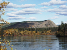 The Yukon River and Tantalus Butte from the downriver end of Carmacks.