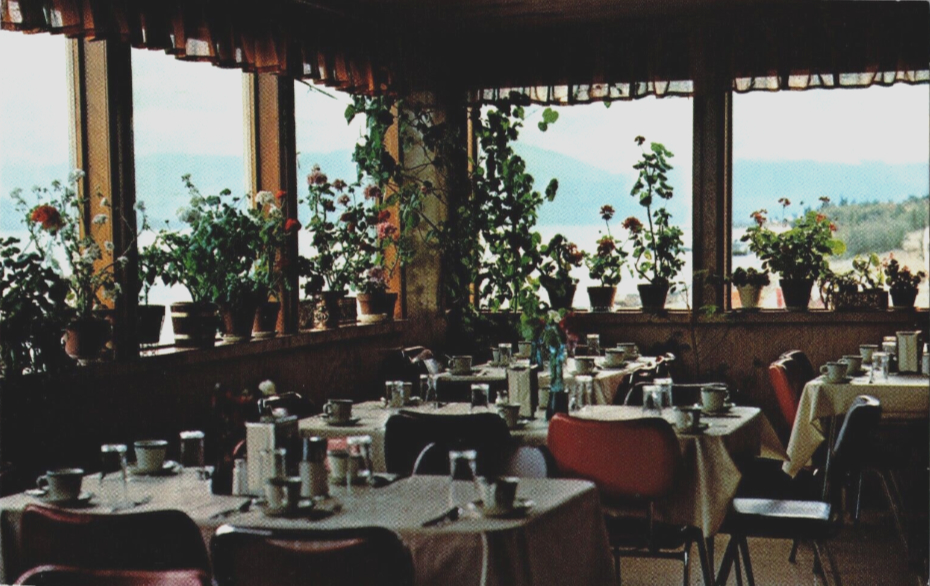 Postcard showing the dining room of the Burwash Landing Hotel on the Alaska Highway, ca. 1980s.