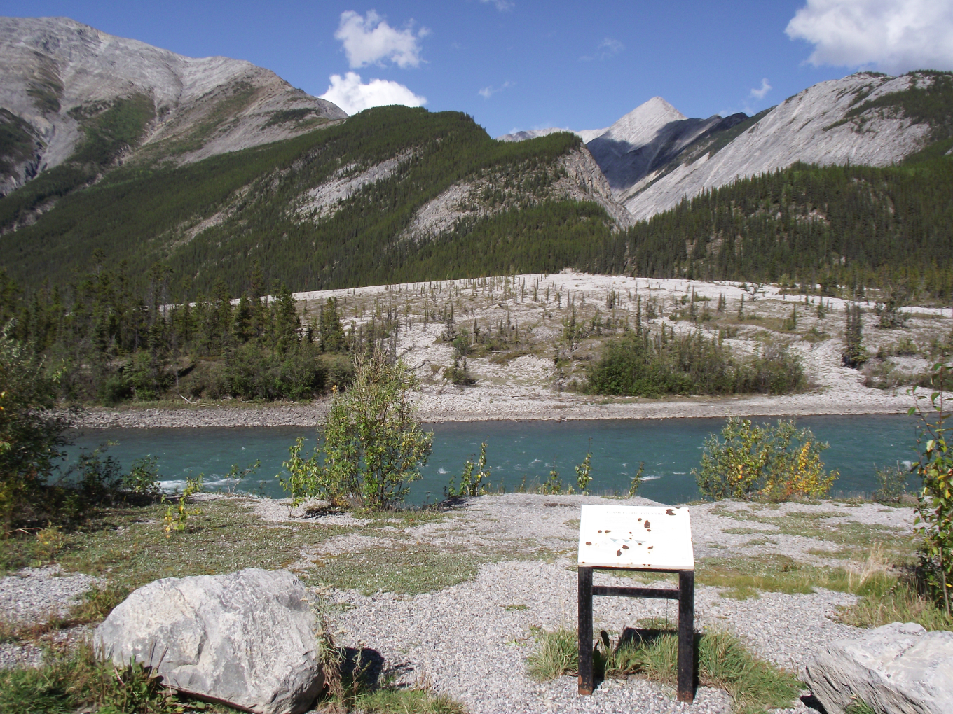 A gravel deposit known as an alluvial fan, caused by flash floods, alongn the Alaska Highway.