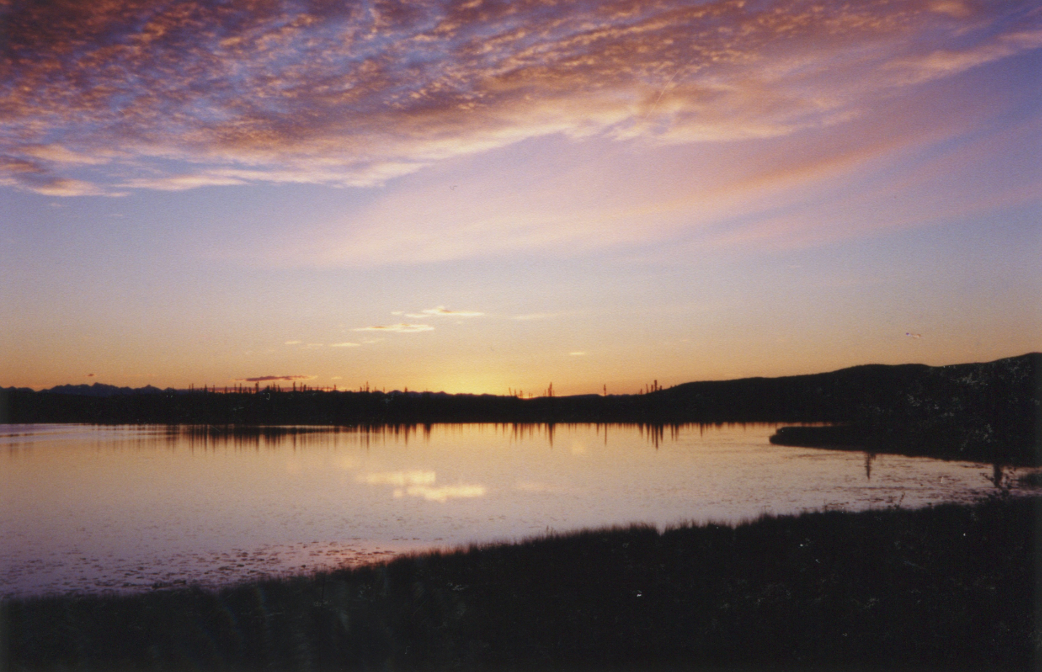 Sunset over Highway Lake, Alaska Highway