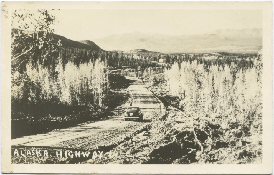 A postcard from the late 1940s showing a car on the new Alaska Highway