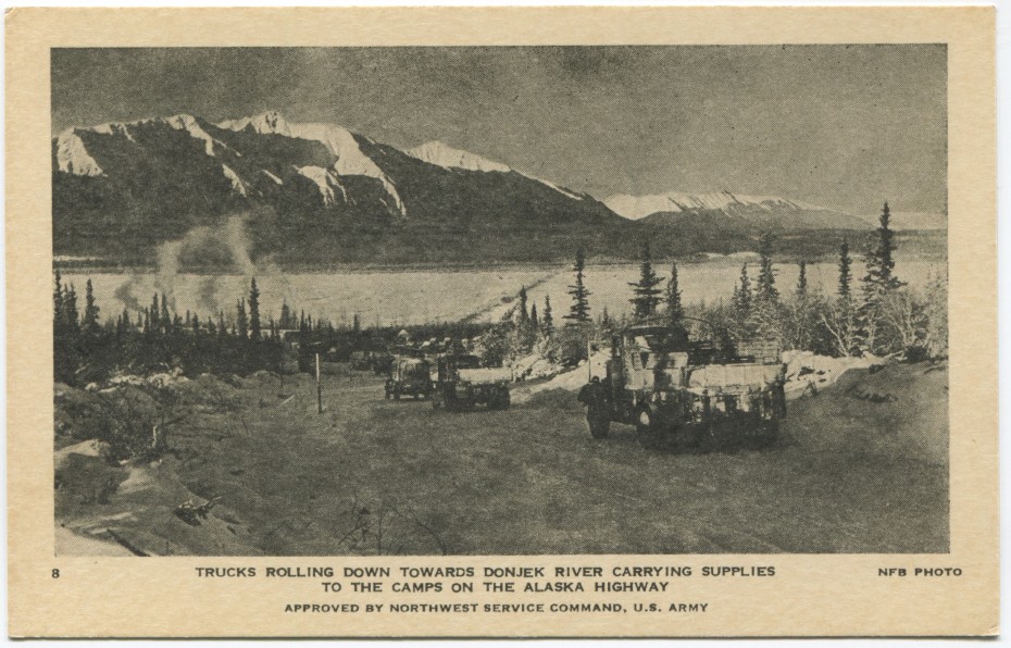 Postcard showing a truck convoy on the Alaska Highway at the Donjek River in the winter, 1942-43