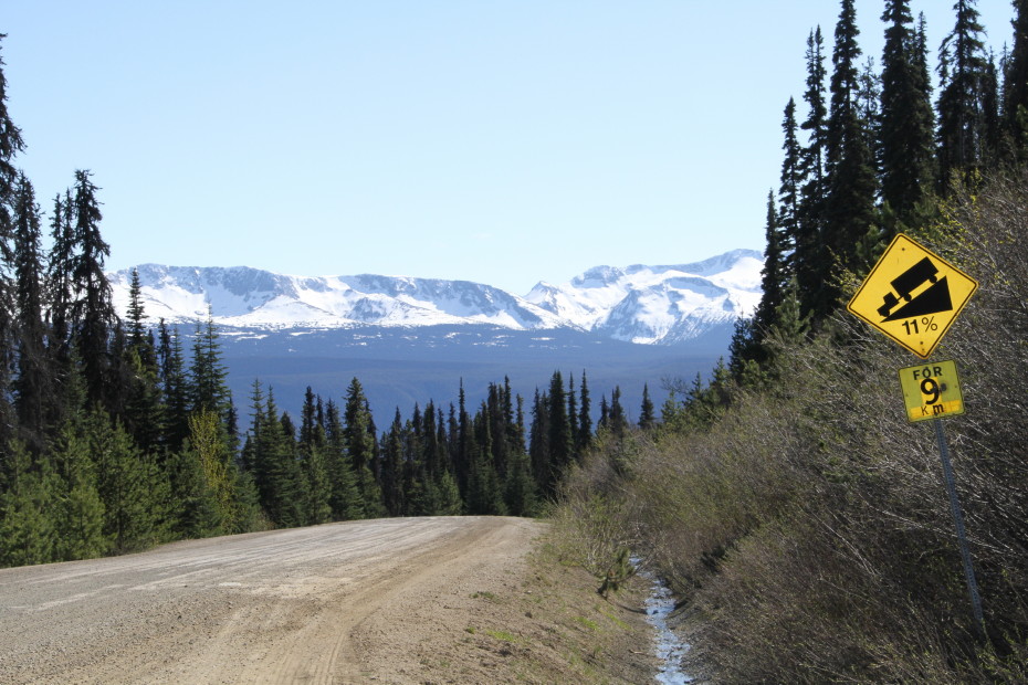 Signs on the Bella Coola hill noting the the start of 9 km of 11% grade or steeper, in May 2016