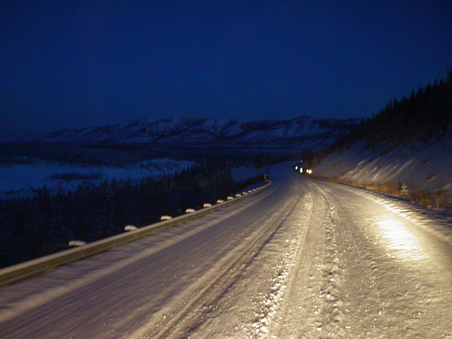 The snowy North Klondike Highway at night