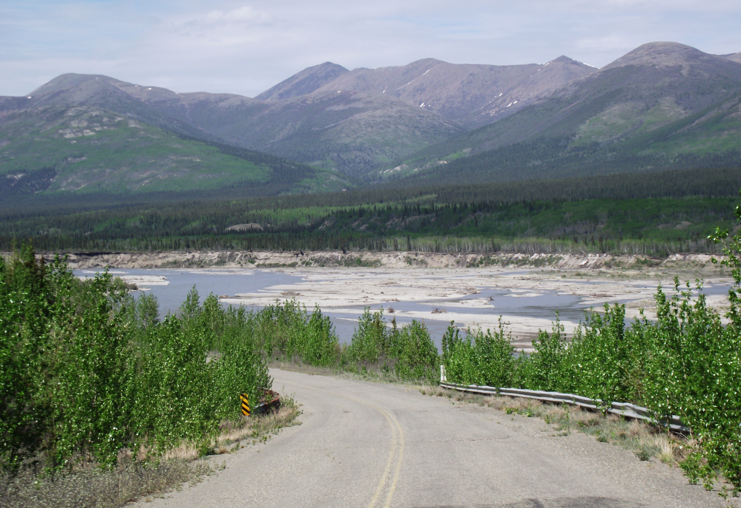Abandoned section of the Alaska Highway along the Kluane River