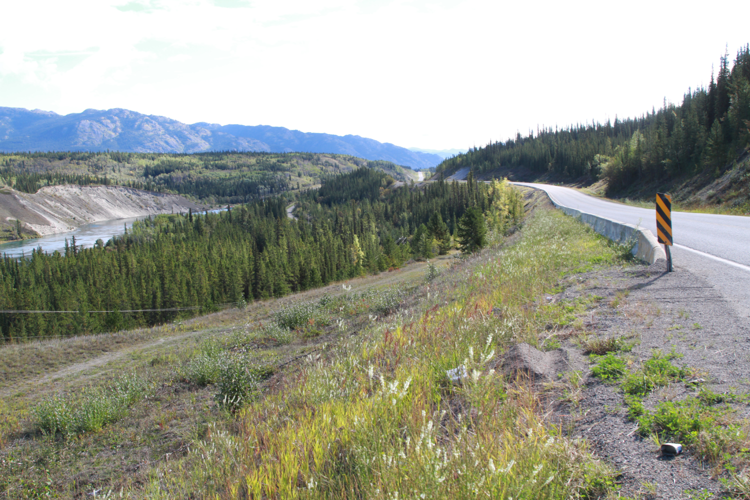 The old and current Alaska Highways a mile west of the Yukon River Bridge in August 2020.