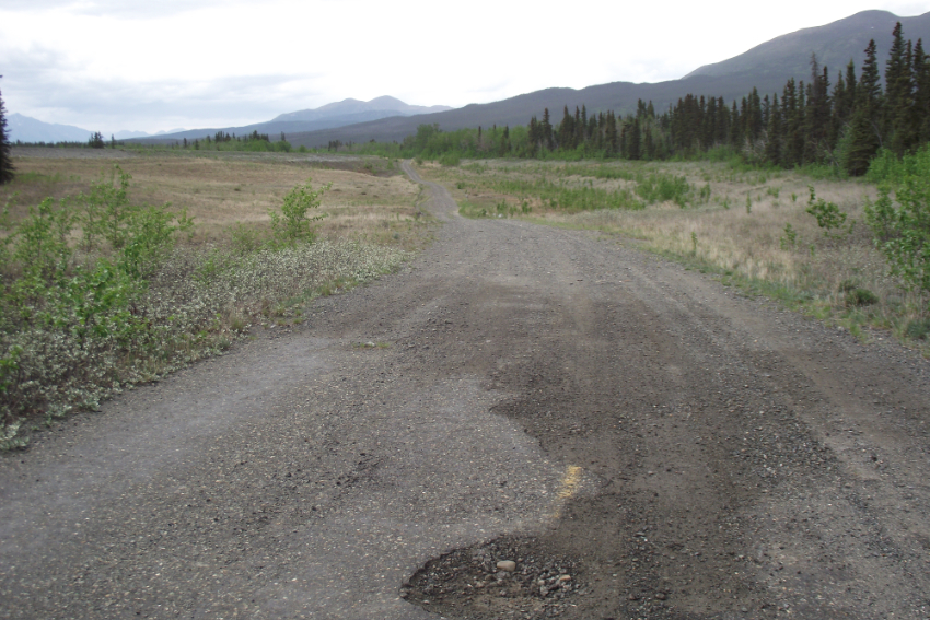 The rough north end of the old Alaska Highway along the Kluane River, Yukon.