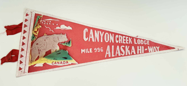 Souvenir pennant from Canyon Creek Lodge, Alaska Highway Mile 996.