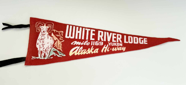 Souvenir pennant from White River Lodge, Alaska Highway Mile 1169.