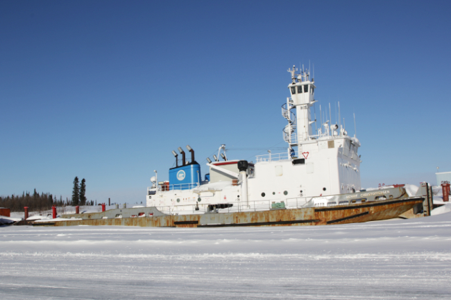 The tug Henry Christoffersen frozen in for the winter on the Mackenzie River at Inuvik on April 9, 2024.