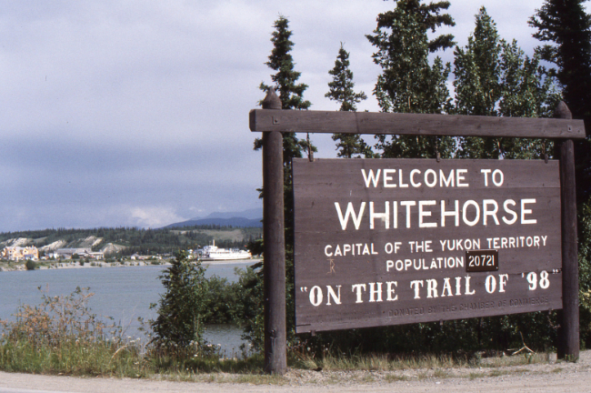 Welcome to Whitehorse sign on South Access Road, 1990
